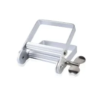 أداة عصر علب المنتجات ومعجون الأسنان